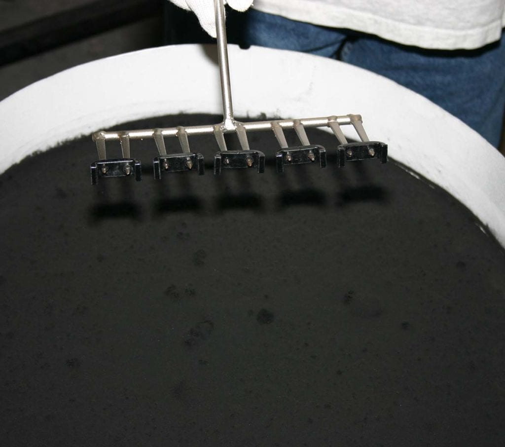 product being dipped into our fluid bed dip