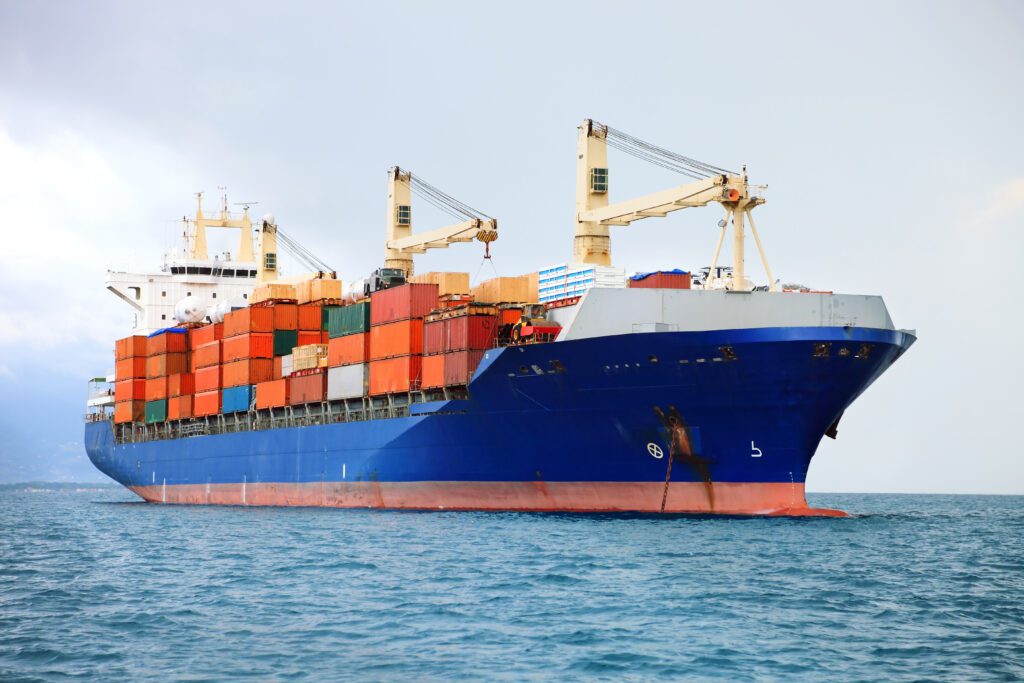 A cargo container ship on the sea.